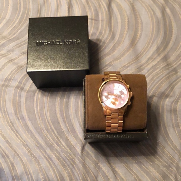 Michael Kors Accessories - Michael Kors rose gold watch/lavender face